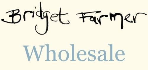 Text 'Bridget Farmer Wholesale' on a beige background